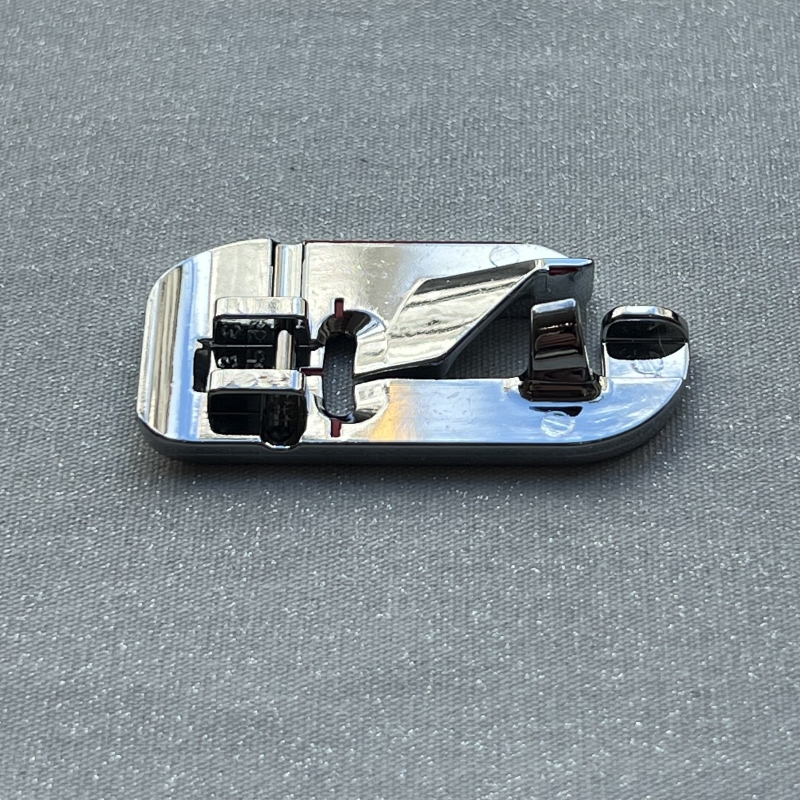 Pied rabatteur pour couture à plat Husqvarna Viking