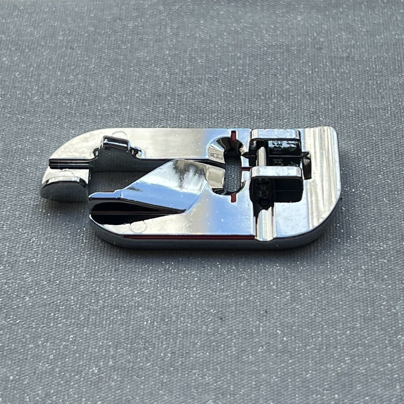 Pied rabatteur pour couture à plat Husqvarna Viking