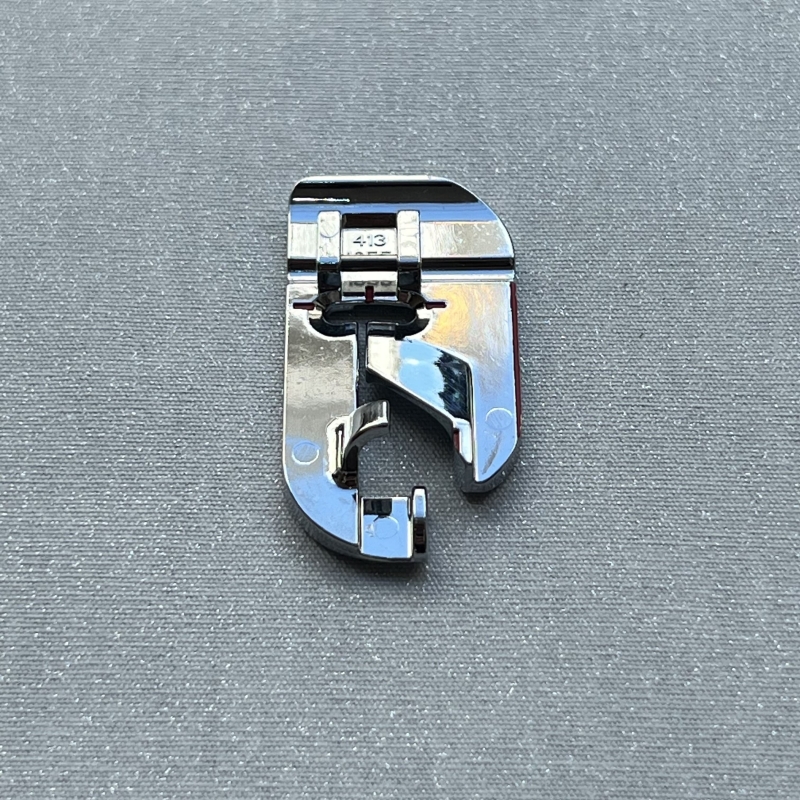 Pied rabatteur pour couture à plat Husqvarna Viking