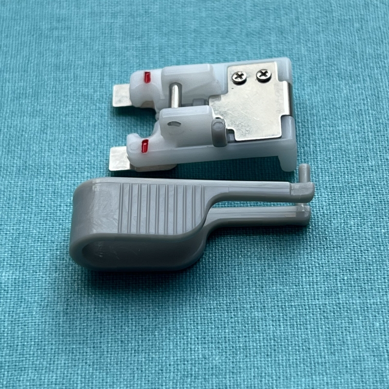 Pied pour pose précise de bouton Husqvarna Viking