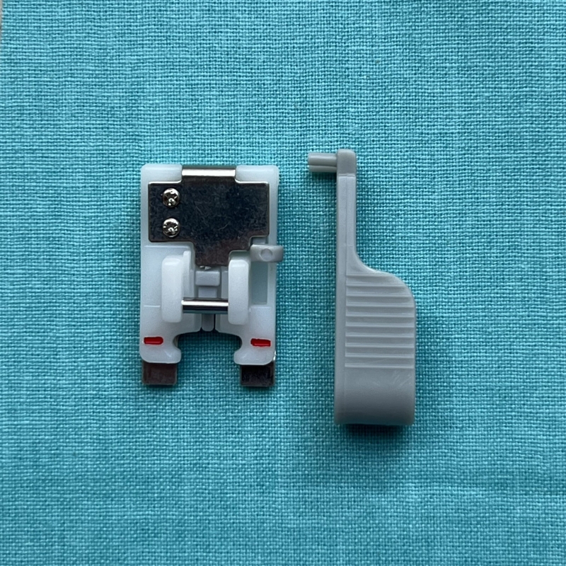 Pied pour pose précise de bouton Husqvarna Viking