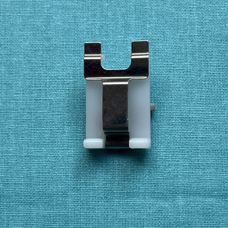 Pied pour pose précise de bouton Husqvarna Viking