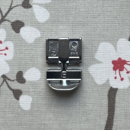 Pied pour fermeture à glissière Husqvarna Viking