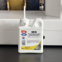 Huile pour machine à coudre...