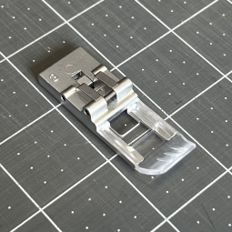 Pied transparent Janome recouvreuse