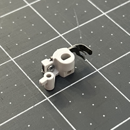 Enfile aiguilles automatique Janome